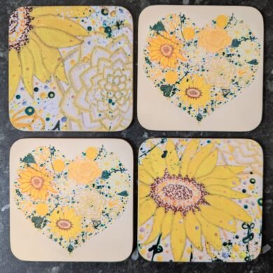 set of 4 coasters with golden floaral heart image