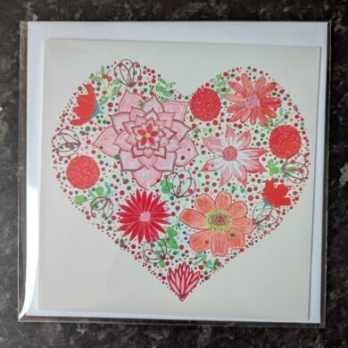 ruby floral heart painting on a greeting card