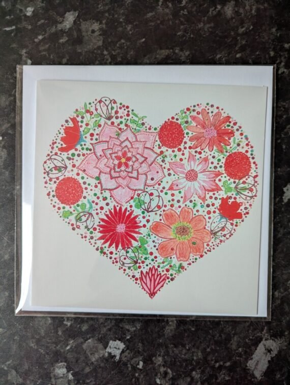 ruby floral heart painting on a greeting card